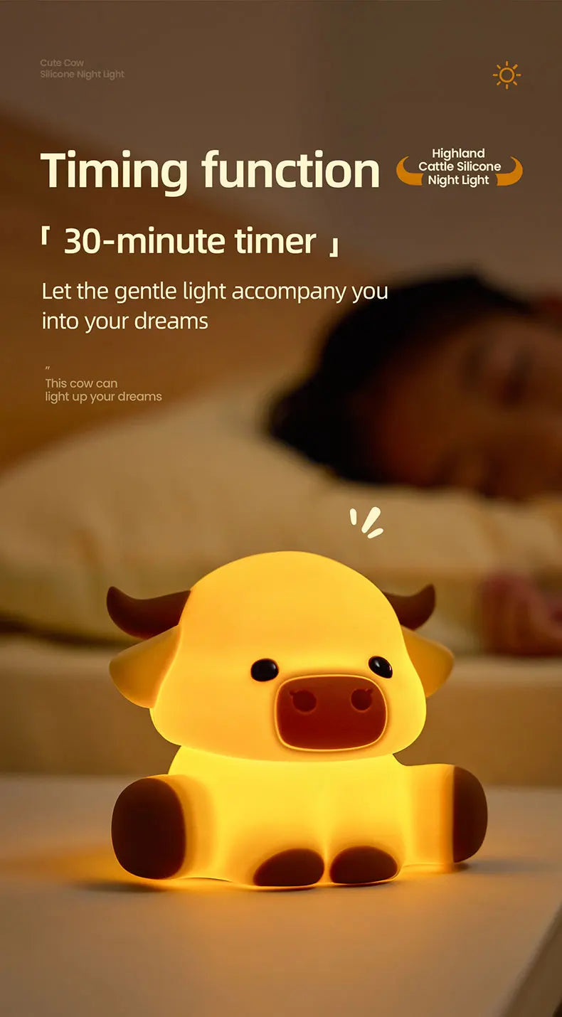 A yellow silicone cow night light with a timer is shown illuminating a sleeping person's face.