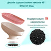 Pink ceramic soap dish with a 45-degree tilt design and a black suction cup holder.