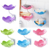 A set of colorful lotus two-tier bathroom storage racks with drainage in purple, pink, and blue.