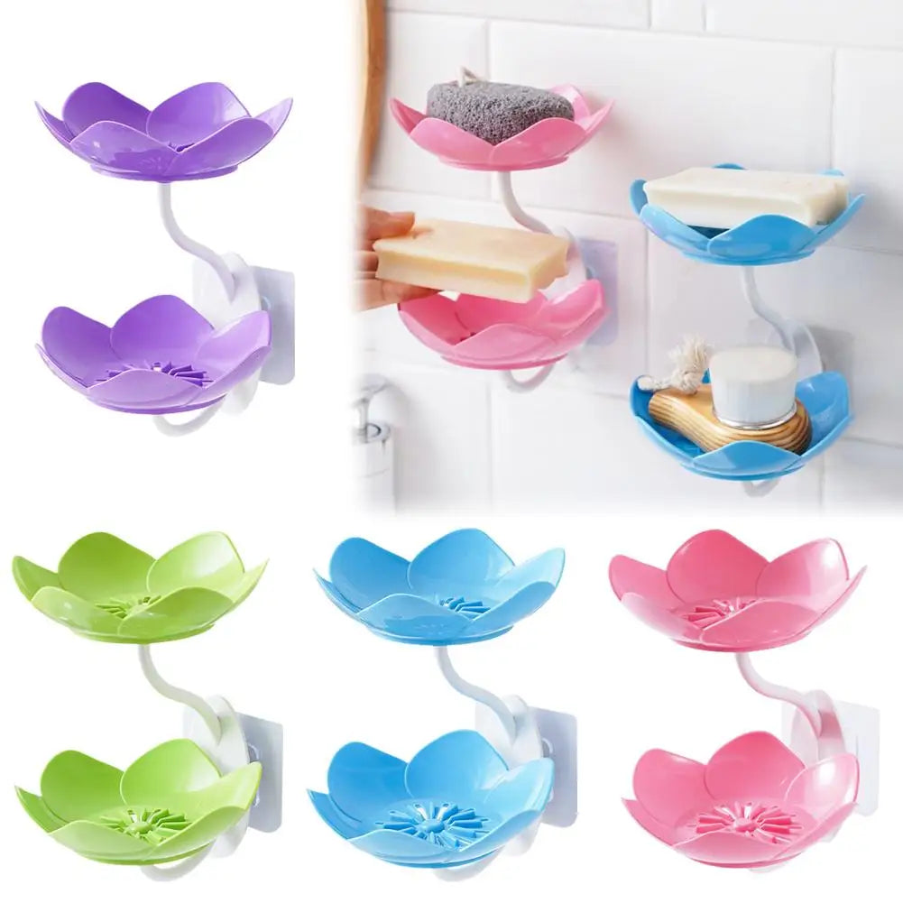 A set of colorful lotus two-tier bathroom storage racks with drainage in purple, pink, and blue.
