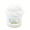 A white jar of moon dreamer non-sticky butter slime with a swirl of white foam on top.