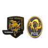 An embroidered patch featuring a stylized fox head and lightning bolt design with the word FOX on a black background.