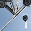A close-up view of a silver high-pressure shower head with multiple nozzles and controls.