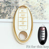 A gold and white soft TPU car key fob cover with five buttons shown next to its black version.