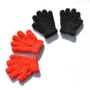 A pair of black and orange plush winter gloves laid out on a white background.