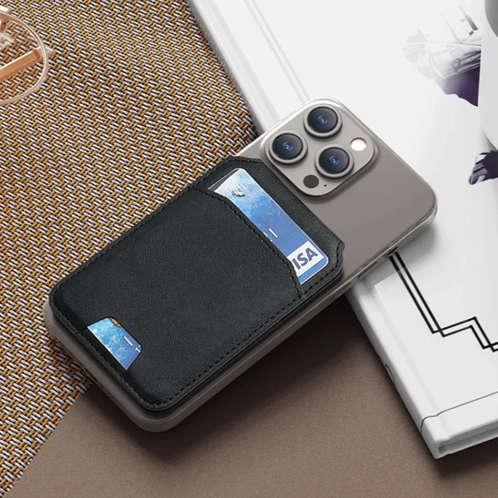 A gray magnetic leather wallet case for an iPhone with a card holder resting on a white surface.