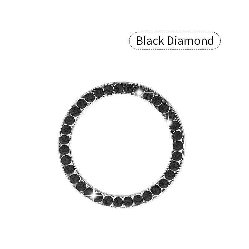 A black diamond ring with a round band and pave-set stones.