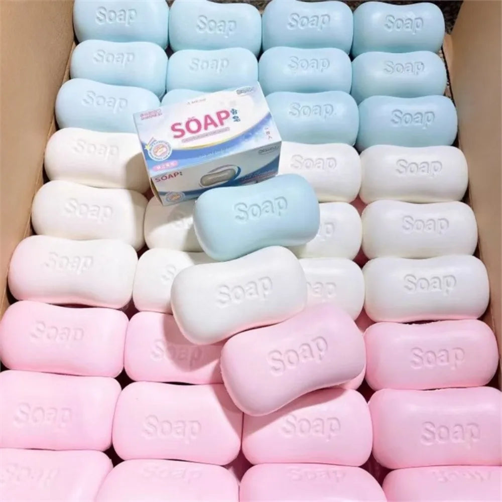 A vertical arrangement of light blue and pink stress relief squishy soap shaped fidget toys.