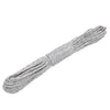 A bundle of reflective paracord rope in gray and white is shown diagonally.