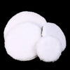 A set of white wool polishing pads for car detailing