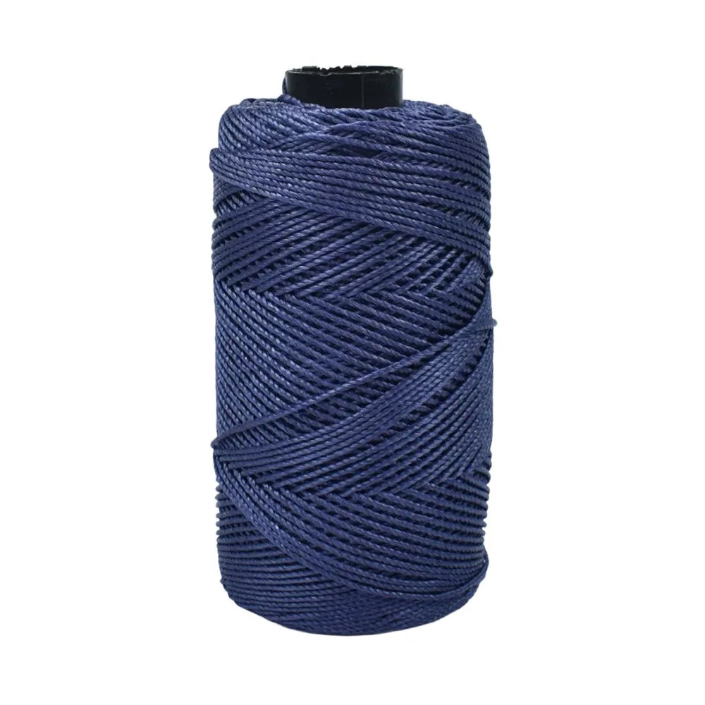 Spool of dark blue ice cotton silk thread for knitting and crochet