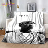 A throw blanket featuring a black and white portrait of Eminem and 2Pac hip-hop icons.