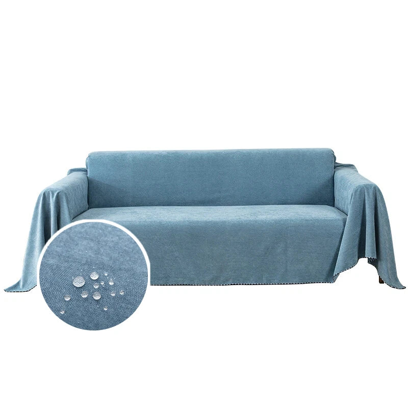 A light blue waterproof anti-slip sofa cover with a tassel hem shown draped over a piece of furniture.