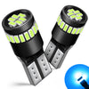 A pair of black LED light bulbs with green illumination and silver bases, showing a close-up view.