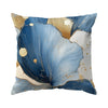 Abstract leaf print cushion cover featuring blue and gold watercolor textures