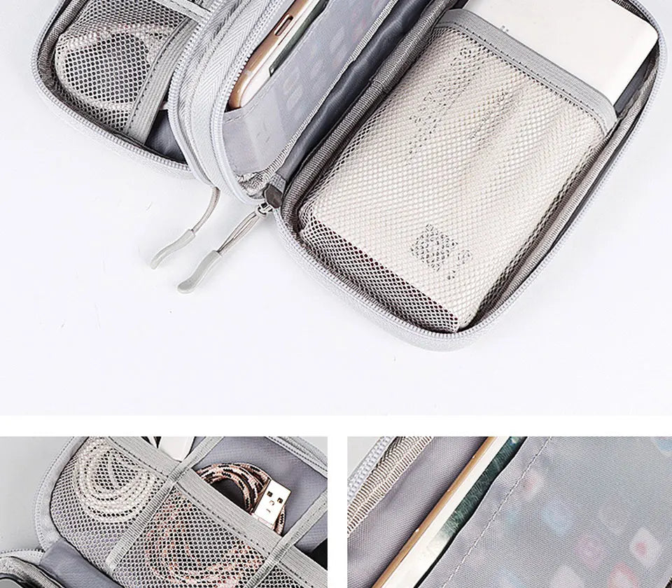 A gray waterproof nylon cable organizer travel case open to show a mesh pocket and internal compartments.