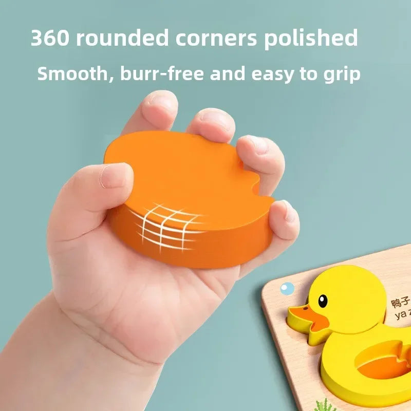A hand holds an orange, smooth, rounded corner object used as a puzzle piece or tool for kids.
