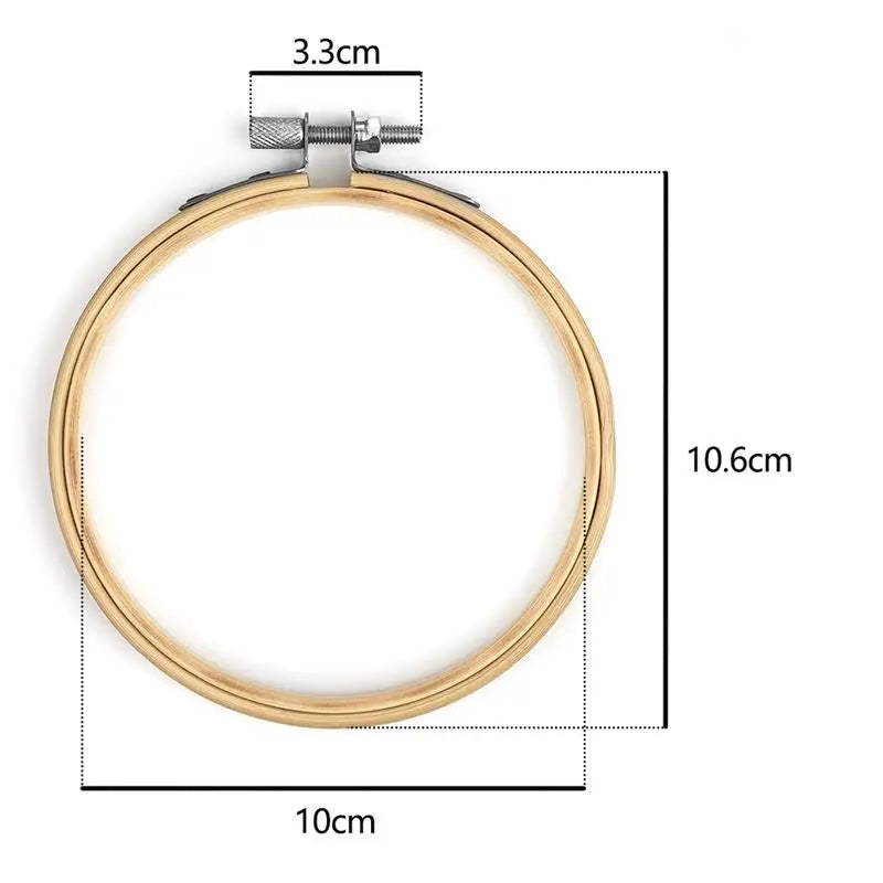A circular bamboo embroidery hoop with an adjustable metal screw, measuring 10.6cm in diameter.