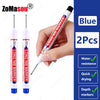 Two long blue markers with black tips are shown being held by a hand, demonstrating depth marking capability.