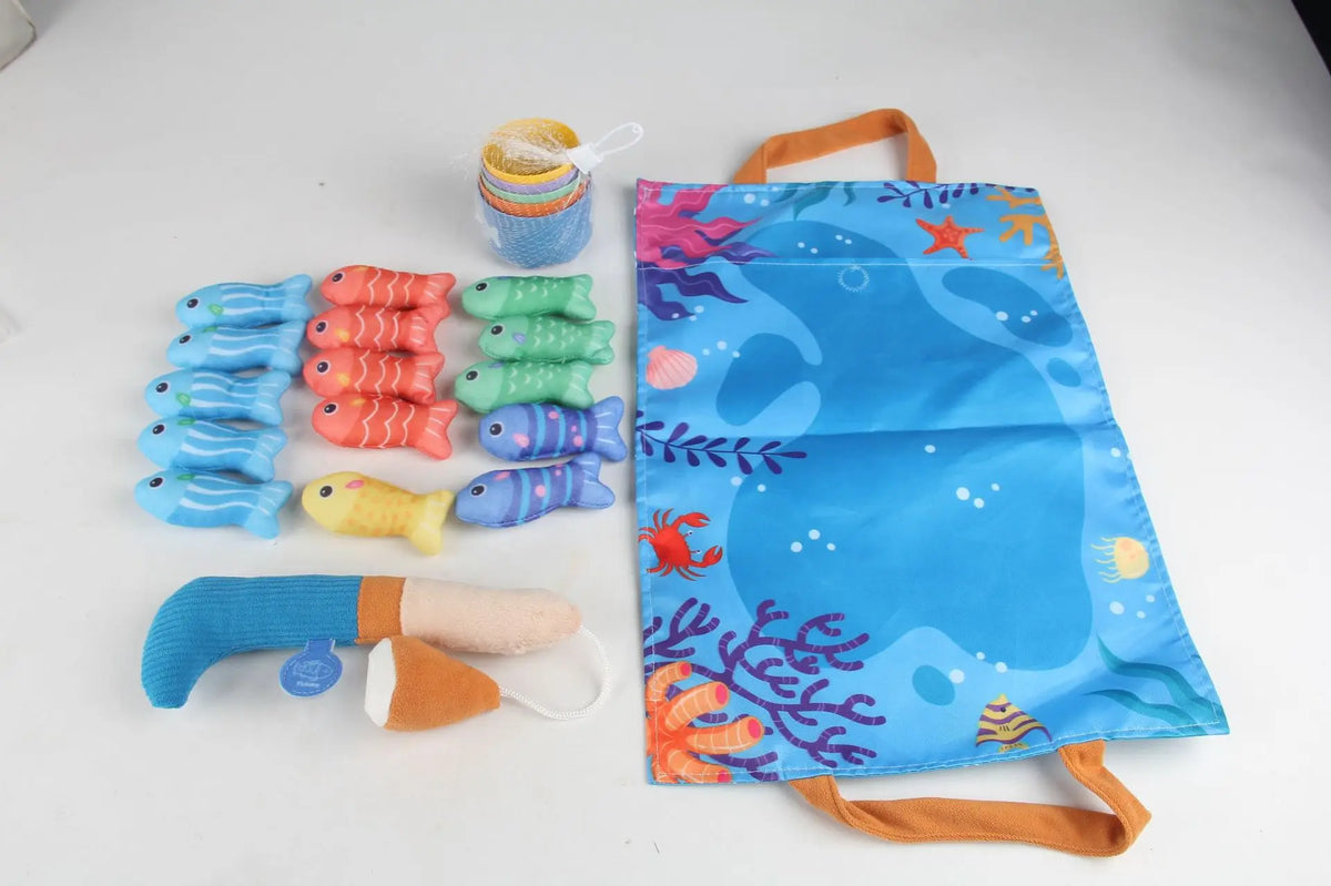 A set of colorful cloth fishing and sorting toys including fish, sea creatures, and a fabric pouch.