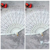 White vintage lace folding hand fan with a durable handle shown against a gray background.