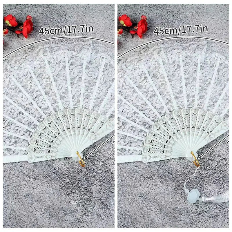 White vintage lace folding hand fan with a durable handle shown against a gray background.