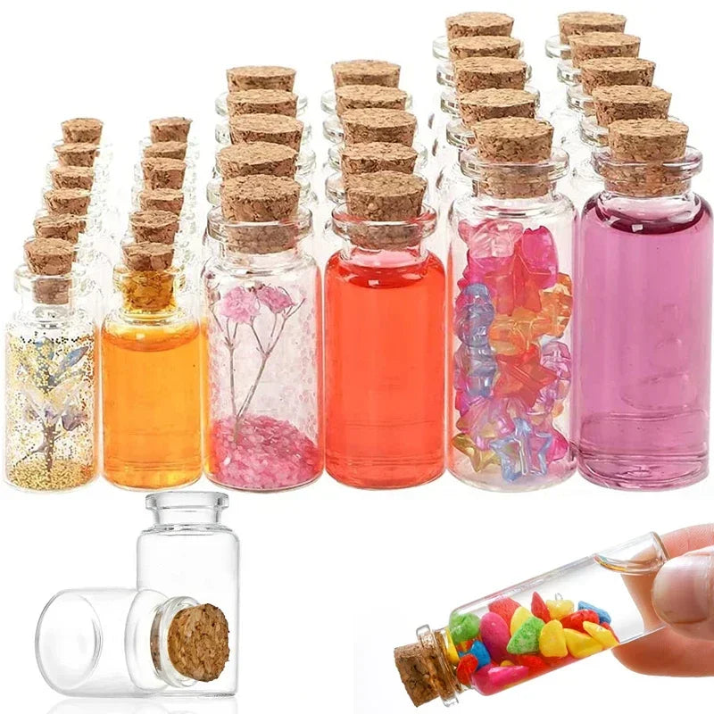 A collection of mini glass bottles with cork stoppers filled with colorful liquids and dried botanicals for DIY crafts