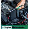 A hand is using a green chrome vanadium socket set with a quick-release ratchet for engine maintenance.