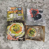 A box of Metal Fight Beyblade Rock Giraffe R145W and a sealed plastic pack of Beyblades.