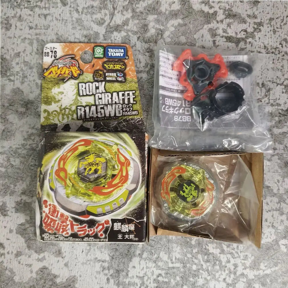 A box of Metal Fight Beyblade Rock Giraffe R145W and a sealed plastic pack of Beyblades.