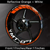 Reflective orange and white decals on a black motorcycle wheel rim for Yamaha MT-07