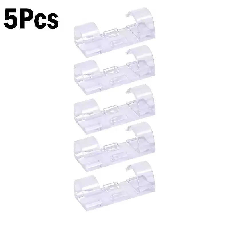 Five clear self-adhesive cable clips used for wire management.