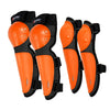 A set of orange and black motocross body armor pads for elbows and knees.