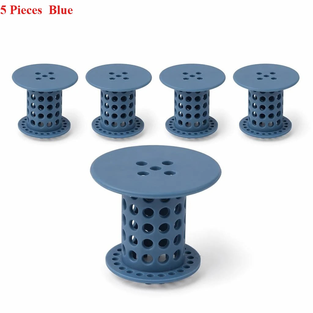 Five blue flexible hair catcher drain covers for sinks and tubs