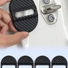 A hand holds a black carbon-fiber door lock cover next to a silver door lock mechanism.