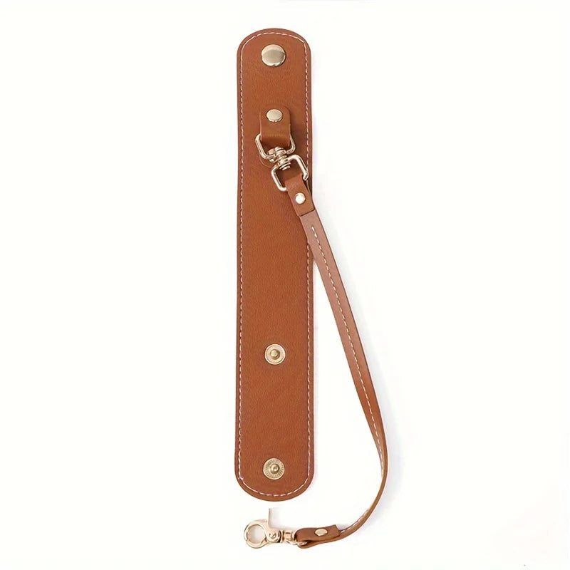 Vintage braunes Lederhandschuhriemen und Handtuchhalter mit Messing-Hardware