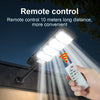 A hand holds a remote control device illuminating a wall light with a bright beam.