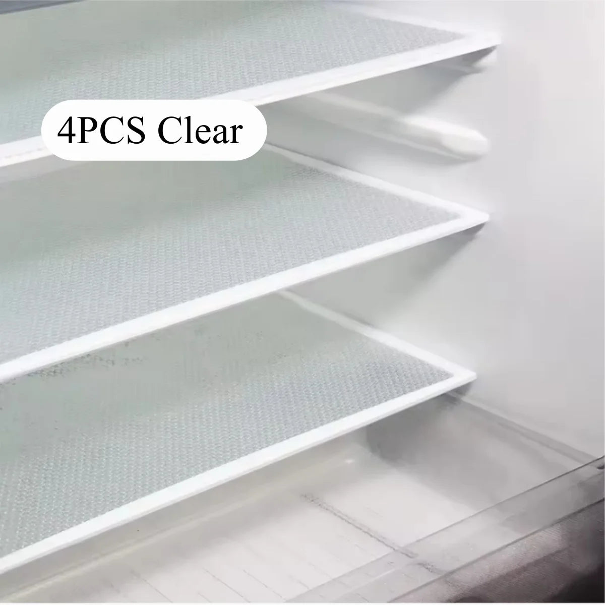 Four clear EVA fridge shelf liners installed in a white cabinet or refrigerator interior.