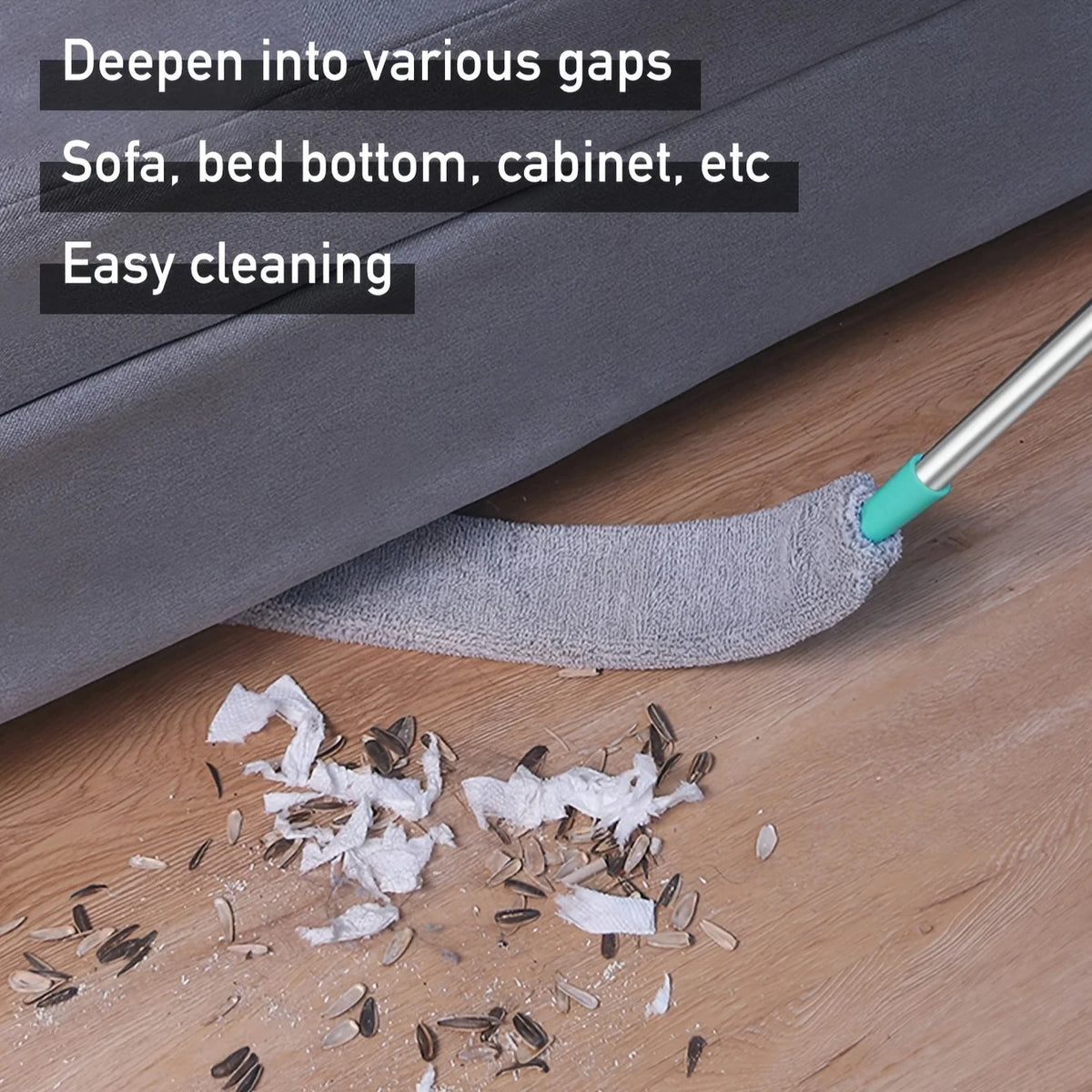 An extendable under-bed duster with five reusable microfiber cloths is shown cleaning dust from a wooden floor.