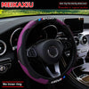 Purple and black sport steering wheel cover for a car interior.