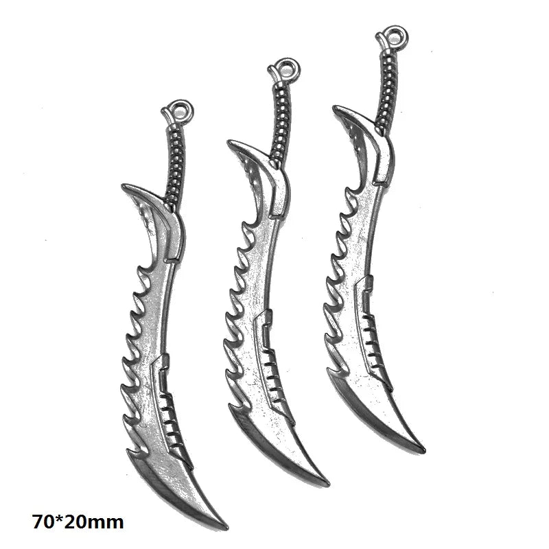 A set of 16 gun-shaped charms for DIY jewelry making in silver metal.