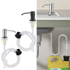 Stainless steel under-sink soap dispenser with a clear plastic extension tube and faucet