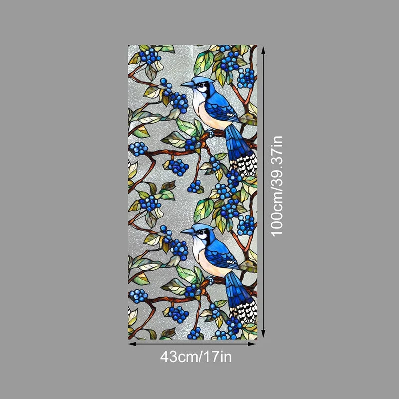 Floral stained glass window film featuring blue birds and dark berries on a gray background