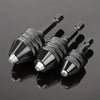 A close-up view of a black quick-change hex shank drill chuck with a round handle resting on a dark, reflective surface.