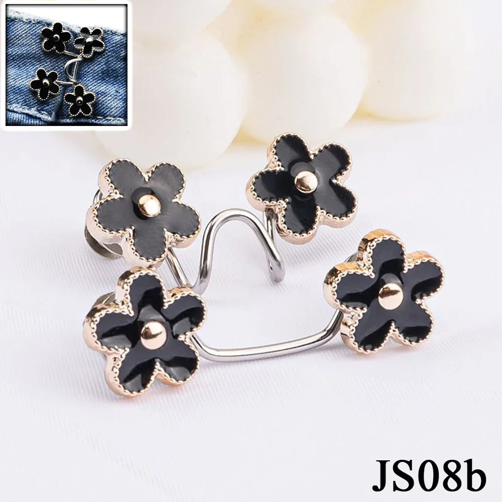 Silver and gold floral buttons used as no-sew adjustable waist tightener buttons for jeans