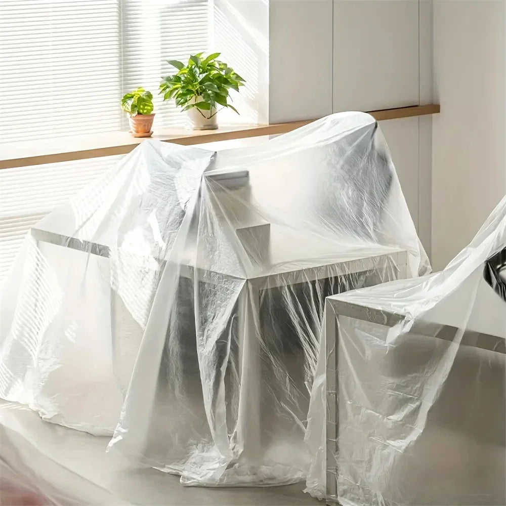 Clear plastic sheeting covering a piece of furniture for painting and protection