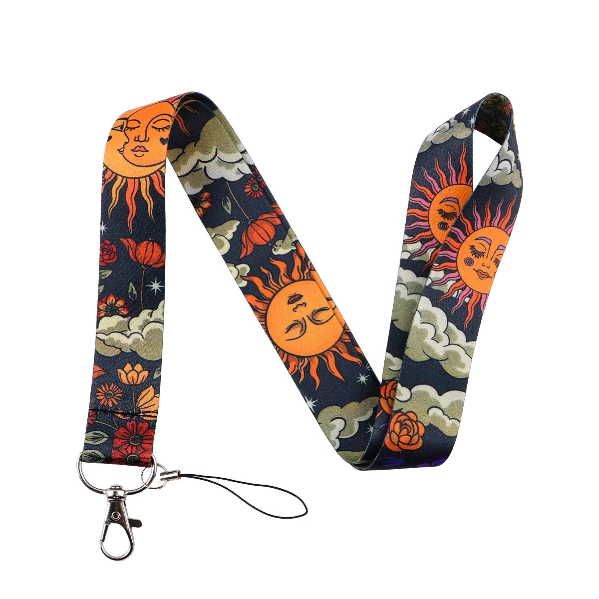A patterned lanyard featuring celestial sun and moon designs on dark fabric.