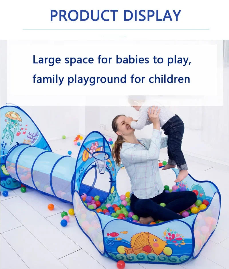A woman is playing with a child in a colorful ball pit play tent and crawl tunnel for children.