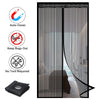 A black magnetic screen door curtain with vertical slats and an automatic closure mechanism.