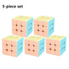 A 5-piece set of pink and blue cube-shaped puzzle pieces for a speed cube.